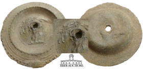 Roman. Lead Plate? with Cupid. 1st - 2nd century AD. A central figure with Cupid to left. Most likely used as the base of a larger vessel. 68 mm, 49.9...