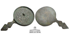 Islamic, Seljuk. Bronze Mirror. 7th- 9th century AD. Fine cast bronze mirror with Arabic calligraphy around the rim. 63 mm, 58.54 g.