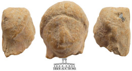 Roman, Egypt. Terracotta female head. 2nd Century CE. Found in Egypt. 24 mm x 32 mm. 19.31 g.