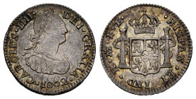 Charles IV (1788-1808). 1/2 real. 1802. Mexico. FT. (Cal-288). Ag. Beautiful patina. Slabbed by NGC as AU 58. Est...200,00. 

Spanish Description: C...