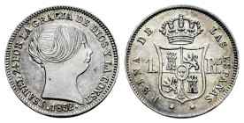 Elizabeth II (1833-1868). 1 real. 1852. Madrid. (Cal-302). Ag. 1,31 g. Almost XF. Est...30,00. 

Spanish Description: Isabel II (1833-1868). 1 real....