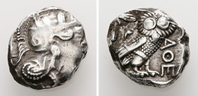 Attica, Athens. AR, Tetradrachm. 17.18 g. - 23.36 mm. Circa 454-404 BC.
Obv.: Helmeted head of Athena right, with frontal eye.
Rev.: AΘE, Owl standing...