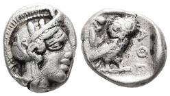 Attica, Athens. AR, Drachm. 4.13 g. - 15.56 mm. Circa 454-404 BC.
Obv.: Helmeted head of Athena right.
Rev.: AΘE, Owl standing right, head facing; oli...