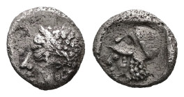 Asia Minor. Uncertain mint (Lampsakos?). AR, Tetartemorion. 0.16 g. - 6.77 mm. Circa 510-490 BC.
Obv.: Archaic style head of female(?) or Apollo left,...
