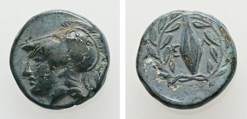 Aeolis, Elaia. AE. 1.28 g. - 10.18 mm. ca. mid 4th-3rd century BC.
Obv.: Helmete...