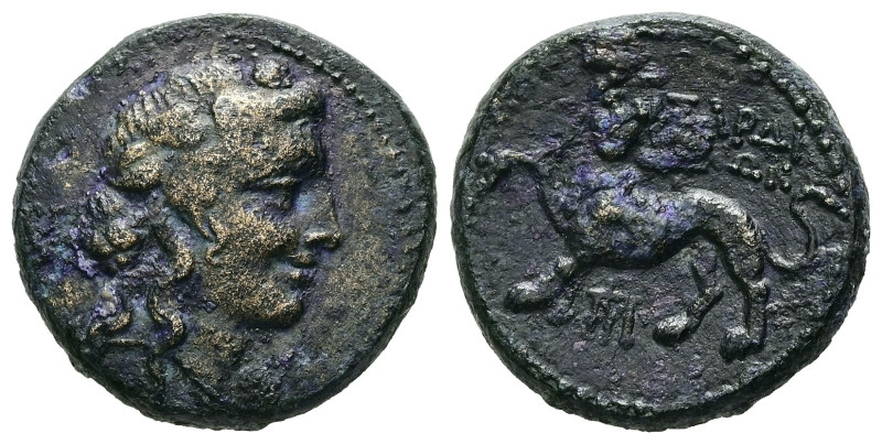 Lydia, Sardes. AE. 5.21 g. - 18.31 mm. 2nd-1st centuries BC.
Obv.: Head of Diony...