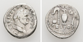 Vespasian, 69-79 AD. AR, Denarius. 2.91 g. 18.61 mm. Rome.
Obv: IMP CAES VESP AVG [P M COS IIII]. Head of Vespasian, laureate, right.
Rev: [AVGVR] TRI...