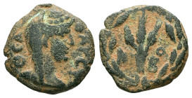 Arabia, Bostra. Diva Faustina, died AD 140/1. AE. 1.61 g. 14.00 mm.
Obv: ΘΕΑ ΦΑΥϹΤ. Veiled and draped bust of the deified Faustina I, right.
Rev: ΝΤ Β...