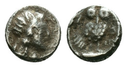 Greek Coins
Attica, Athens AR obol (Silver, ) c. 450 BC Attica, 
Obv: Helmeted head of Athena r.
Rev: Owl standing r., head front, single leaf and ber...