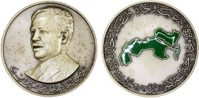 IRAQ: silver-washed base-metal medal (157.00g), 70mm; bust of Saddam Hussein // map of the Arab world (painted green), including Mauritania, Somalia, ...