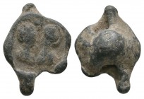 Ancient Byzantine Coins - Figural Lead Seal
7th-9th century AD. A uniface lead seal depicting two half figures with halos. 5.58 grams. 
Fine.
Estim...