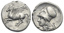BRUTTIUM. Medma. Circa 330-320 BC. Stater (Silver, 20.66 mm, 8.55 g). Pegasos flying to left. Rev. Head of Athena to left with pearl necklace, wearing...