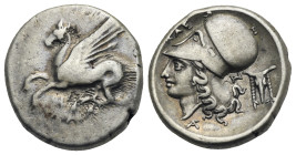 AKARNANIA. Anaktorion. Circa 320-280 BC. Stater (Silver, 21 mm, 8.55 g). ΑΝ (ligate) Pegasos flying to left with straight wings. Rev. Head of Athena t...