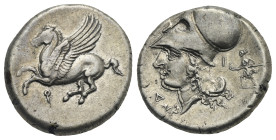 CORINTHIA. Corinth. Circa 345-307 BC. Stater (Silver, 21.00 mm, 8.58 g). Pegasos flying to left; below, Ϙ. Rev. Head of Athena to left, wearing Corint...