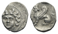 CARIA. Uncertain. Circa 4th Century BC. Obol (Silver, 10.42 mm, 0.79 g). Facing female head. Rev. Sphinx seated left. SNG Levante 250. SNG France 479....