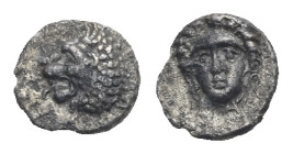 SATRAPS OF CARIA. Hekatomnos, 395-377 BC. Tetartemorion (Silver, 6.33 mm, 0.23 g) Mylasa circa 390-380 BC. Head of roaring lion left protruding tongue...