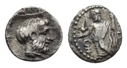 CILICIA, Tarsos. Tiribazos. Satrap of Lydia, 388-380 BC. AR Obol (Silver 8.43 mm, 0.77 g). Struck circa 384-383 BC. Ba’al standing left, holding eagle...