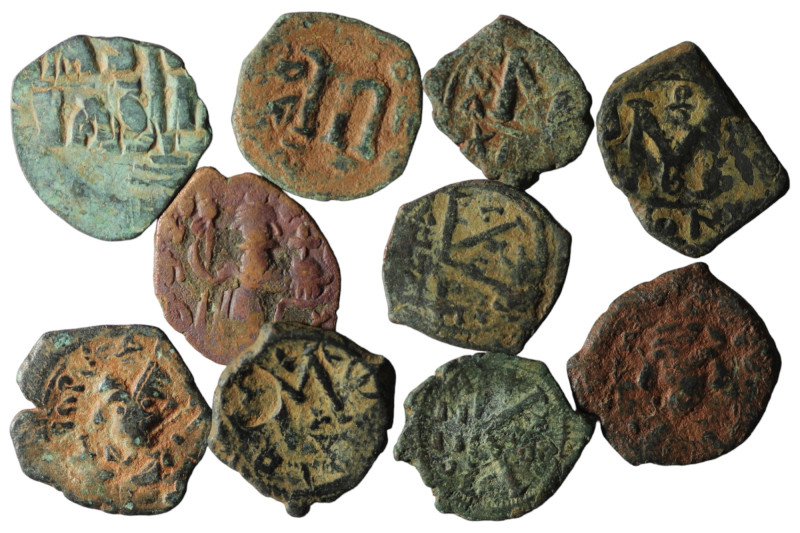 Lot of 10 byzantine bronze coins. artifcial sandpatina. sold as seen, no return.