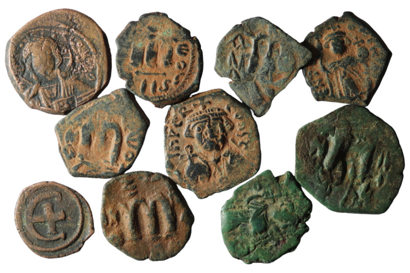 Lot of 10 byzantine bronze coins. artifcial sandpatina. sold as seen, no return.