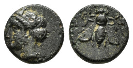 IONIA.Ephesos.(Circa 375-325 BC).Ae.

Obv : Female head left, wearing stephane.

Rev : E - Φ.
Bee.

BMC 68; SNG Aulock 1839; SNG Copenhagen 256.

Cond...