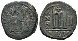 PHOCAS with LEONTIA (602-610). Theoupolis (Antioch).Follis.

Condition : Good very fine.

Weight : 11.81 gr
Diameter : 26 mm