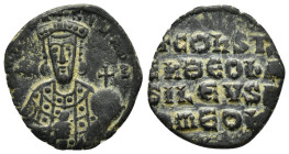 CONSTANTINE VII PORPHYROGENITUS with ROMANUS I.(913-959).Constantinople.Follis.

Obv : + COҺST ЬASIL RωM.
Crowned bust of Constantine facing, holding ...