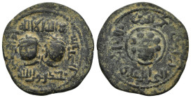 ARTUQID of MARDIN.Nasir al-Din Artuq Arslan. (1200-1239).AH 606.Mardin.Dirhem.

Obv : Male figure seated side-saddle on leopard left; circular legend ...