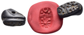 SUMERIAN.Stone cylinder seal.emdet Nasr Period.(circa 3100-2900 BC).

Condition : Good very fine.

Weight : 3.76 gr
Diameter : 15 mm