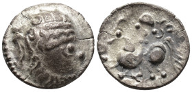 EASTERN CELTS. Middle Danube. 'Kapostal' type. Drachm (AR, 15 mm, 1.57 g) 2nd–1st century BC.

Stylized laureate head of Zeus right. / Stylized hors...