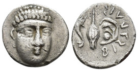 CAMPANIA. Phistelia. Obol (AR, 11 mm, 0.52 g) c. 325–275 BC

Male head facing slightly to right. / Dolphin to right, barley grain and mussel shell; ...