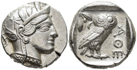 ATTICA. Athens. Tetradrachm (AR, 25 mm, 17.16 g) c. 454–404 BC.

Head of Athena right, wearing crested Attic helmet decorated with three olive leave...