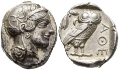 ATTICA. Athens. Tetradrachm (AR, 25 mm, 17.25 g) c. 454–404 BC.

Head of Athena right, wearing crested Attic helmet decorated with three olive leave...