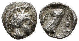 ATTICA. Athens. (Circa 454-404 BC).
AR Hemiobol (7.2mm 0.32g)
Obv: Helmeted head of Athena right.
Rev: AΘE.Owl standing right, head facing; olive s...