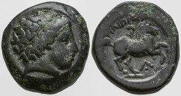 KINGS OF MACEDON. Philip II (359-336 BC). Uncertain Macedonian mint
AE Unit (18.8mm 7.61g)
Obv: Diademed head of Apollo right.
Rev: Youth on horseb...