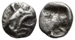 IONIA. Teos. (Circa 475-450 BC).
AR Tetartemorion (5.9mm 0.25g)
Obv: Head of griffin right
Rev: Quadripartite incuse square.
SNG Kayhan 603