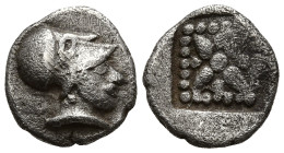 ASIA MINOR. Uncertain. (5th century BC).
AR Hemiobol (8.1mm 0.4g)
Obv: Helmeted head (of Athena?) right.
Rev: Star or stellate pattern consisting o...