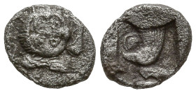 ASIA MINOR. Uncertain. (circa 550-400 centuries BC)
AR Tetartemorion (6.1mm 0.23g)
Obv: Facing gorgoneion, with mouth open and tongue protruding.
R...