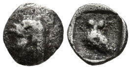 WESTERN ASIA MINOR. Uncertain. (Circa 5th century BC)
AR Tetartemorion (6mm 0.17g)
Obv: Archaic head of Apollo to left
Rev: Owl standing to left, h...