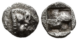 ASIA MINOR. Uncertain mint. (5th century BC)
AR Hemitetartemorion (or tetartemorion) (5.1mm 0.1g)
Obv: Head of boar to right, neck composed of pelle...