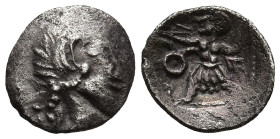 UNCERTAIN LEVANTINE. (4th century BC).
AR Tetartemorion (6.8mm 0.13g)
Obv: Head of Silenos (?) to right.
Rev: Slinger in throwing stance left, mono...