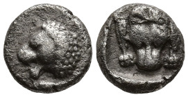 CARIA. Uncertain. (Circa 5th century BC).
AR Obol (7.7mm 0.6g)
Obv: Forepart of a roaring lion left.
Rev: Facing panther's head within incuse squar...