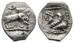 CARIA. Uncertain. (4th century BC).
AR Tetartemorion (6.8mm 0.13g)
Obv: Boar grazing rigth.
Rev: Sphinx (?) seated left within pelleted linear bord...