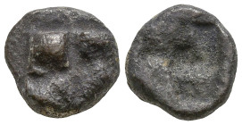 IONIA. Uncertain. (Circa Late 6th-early 5th century BC)
AR Obol (7.3mm 0.51g).
Obv: Raised clockwise swastika pattern
Rev: Quadripartite square pun...