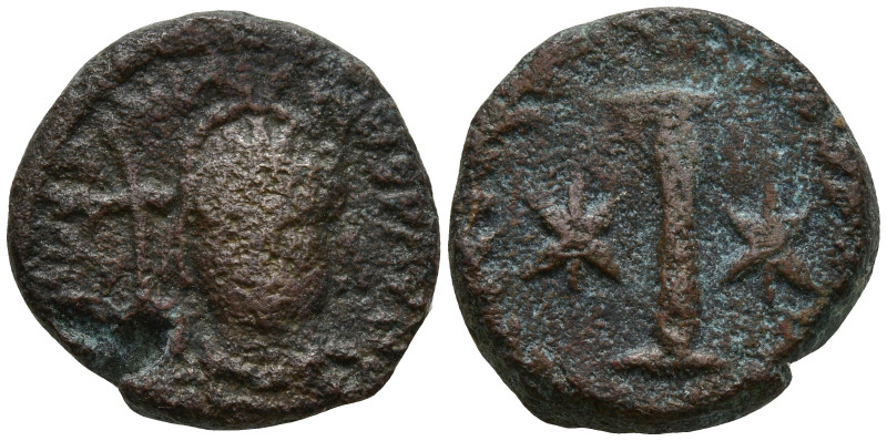 Justinian I (527-565 AD). Rome
AE Decanummium (17.5mm 5.42g)
Obv: Helmeted and...