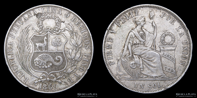 Perú. 1 Sol 1869 YB. Plata 900; 37mm; 24.64g. KM196.3 Material desprendido en re...