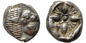 IONIA. Miletos. Late 6th-early 5th centuries BC. Obol (1.27 g, 9 mm). Forepart of lion left, head right. Rev. Stellate floral design; all within incus...