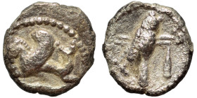 PHOENICIA. Tyre. Circa 425-394 BC. 1/24 Shekel (silver, 0.49 g, 8 mm). Hippocamp to right; below, dolphin right. Rev. Owl standing right, head facing;...