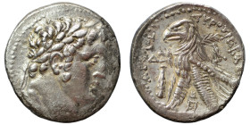 PHOENICIA. Tyre. 126/5 BC-AD 65/6. Shekel (silver, 13.67 g, 28 mm), Year ΔΞ = Year 64, 63/62 BC. Laureate head of Melkart right, [lion skin around nec...
