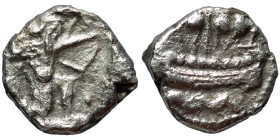 PHOENICIA. Sidon. Uncertain king, circa 435-425 BC. 1/16 Shekel (silver, 0.67 g, 8 mm). Persian king or hero in kneeling-running stance right, drawing...