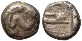PHOENICIA. Arados. Uncertain king. Circa 440-420 BC. Third Shekel (silver, 3.35 g, 12 mm). Marine deity right, holding fish in each hand. Rev. Galley ...
